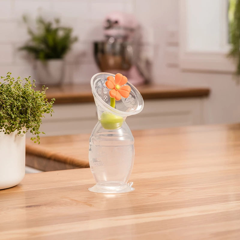 Haakaa Brystpumpe 100ml med blomsterstopper (Orange)